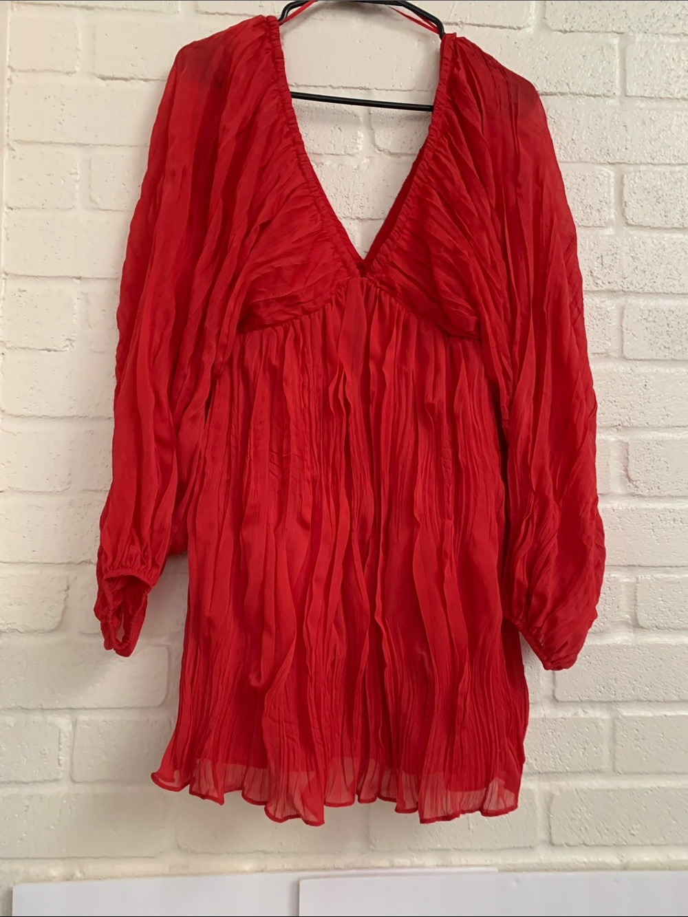 Red V-Neck Long Sleeve Women's Top
Statement holiday?